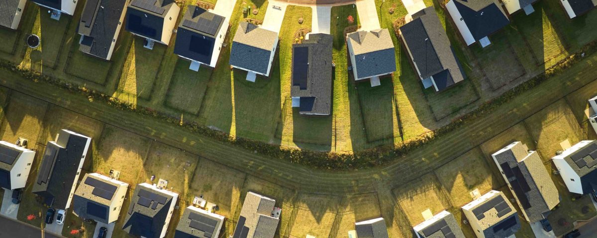 View from above of densely built residential houses in living area in South Carolina. American dream homes as example of real estate development in US suburbs.